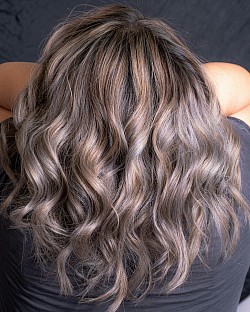 Gray wavy half wig w/black headband attached 18 in Long. Priced at $28