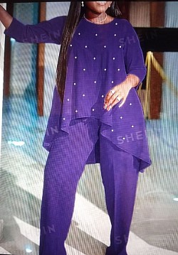 Purple two-piece pants set with pearl design and print size 22 $28