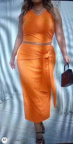 Orange two-piece crop top w/maxi skirt with a tie size 22 with lots of stretch $25